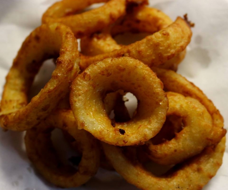 Beer batter onion rings 8.99 Catfish Deweys South Florida seafood